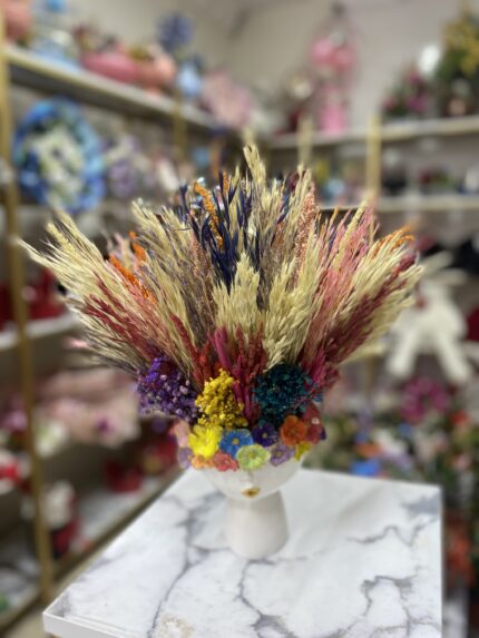 Kuru çiçekli renkli orta boy saksı